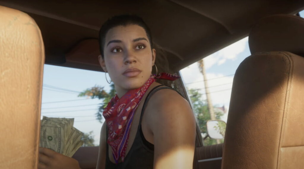 Personagem Lucia do jogo GTA 6 dentro de um carro segurando dinheiro